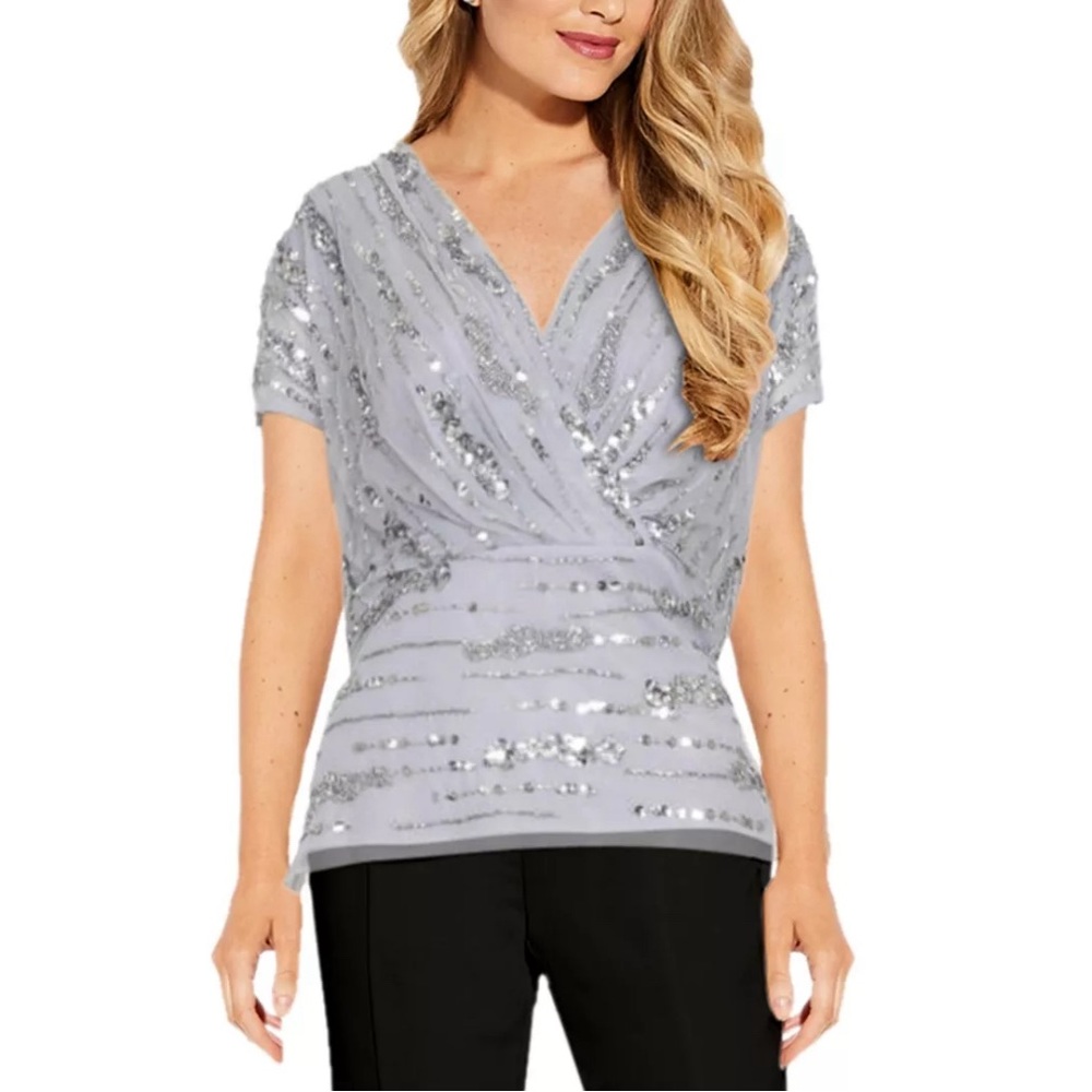 Adrianna Papell beaded mesh peplum top in Silver.